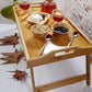 Table pliable en bois pour des moments de confort au lit