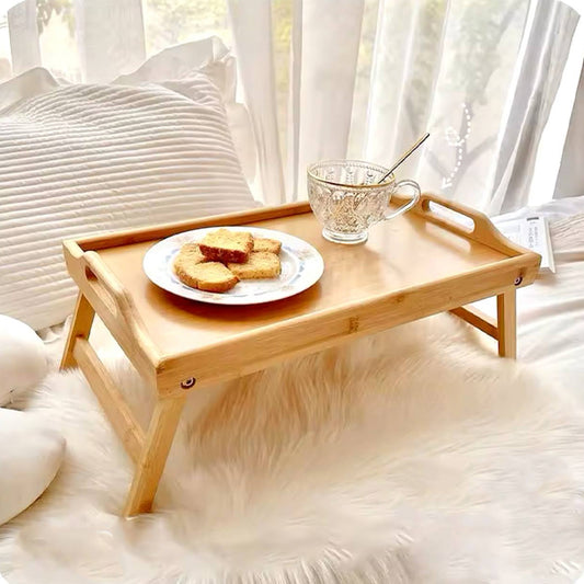 Table pliable en bois pour des moments de confort au lit